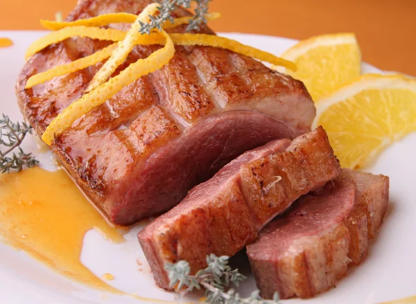 Gourmet duck meat and orange sauce — Stock Photo, Image