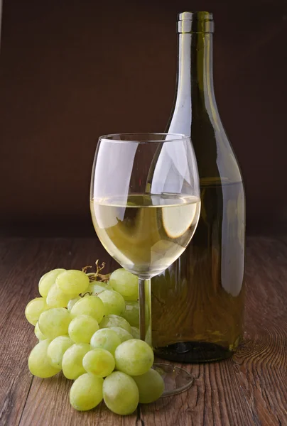 stock image Wineglass and bottle