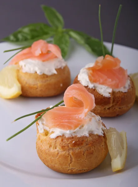Choux with cream and salmon — Stock Photo, Image