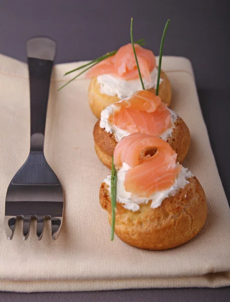 Choux with cream and salmon — Stock Photo, Image