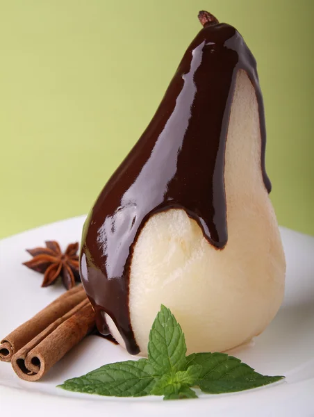 Pear with chocolate — Stock Photo, Image