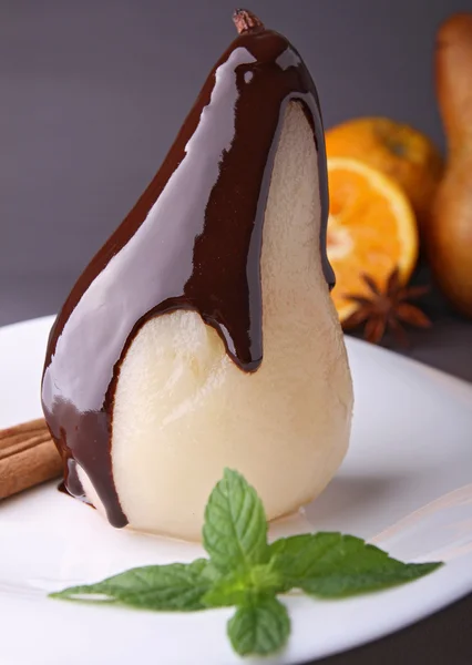 Poached pear with chocolate — Stock Photo, Image