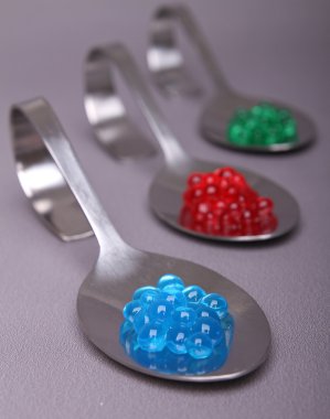 Spoon of molecular caviar clipart