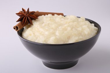 Rice puddding with cinnamon clipart