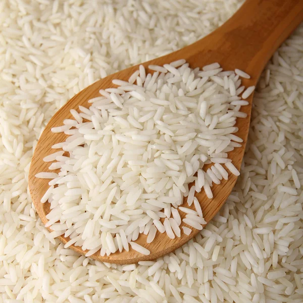 Syrové rýže a lžíce — Stock fotografie