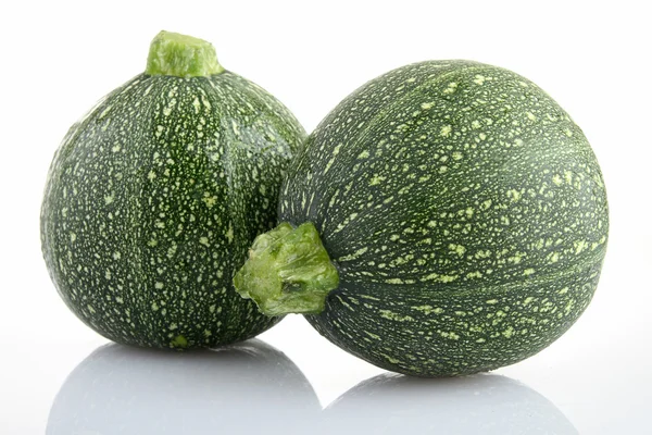Raw zucchini on white background — Stock Photo, Image