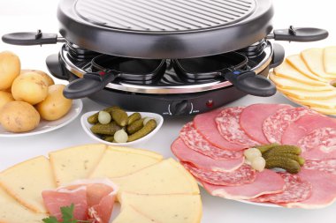 Raclette,cheese and delicatessen clipart