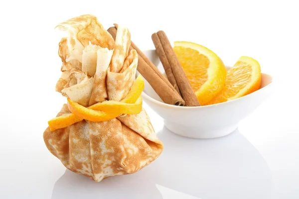 Crepe with orange on white background — Stock Photo, Image
