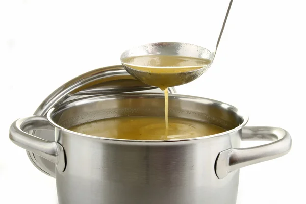 Pot with soup — Stock Photo, Image