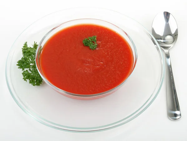 Sopa de tomate isolada e salsa — Fotografia de Stock