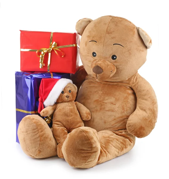 Christmas teddy bear with gifts boxes — Stock Photo, Image