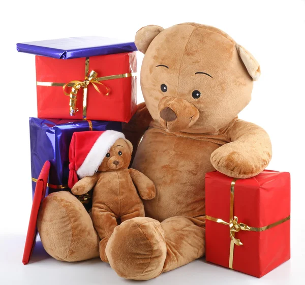 Christmas teddy bear with gifts boxes — Stock Photo, Image