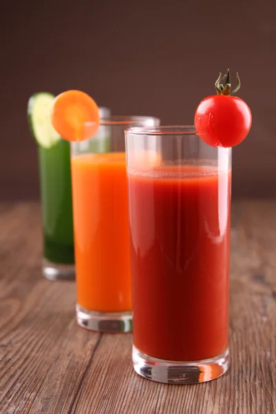 stock image Vegetables cocktails on wooden background