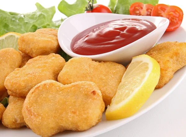 Plate of nuggets and ketchup — Stock Photo, Image