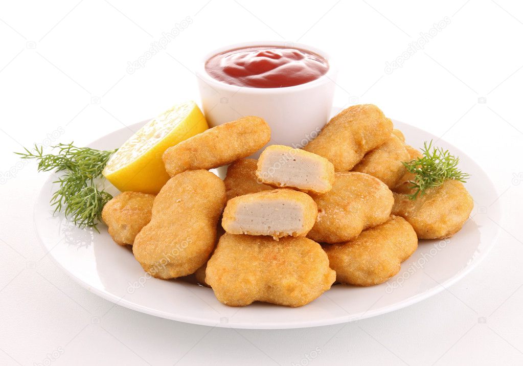 Isolated plate of nuggets with ketchup