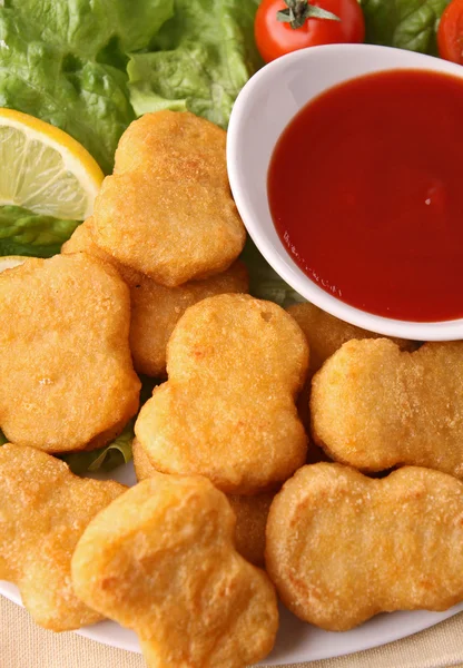 Nuggets and ketchup — Stock Photo, Image
