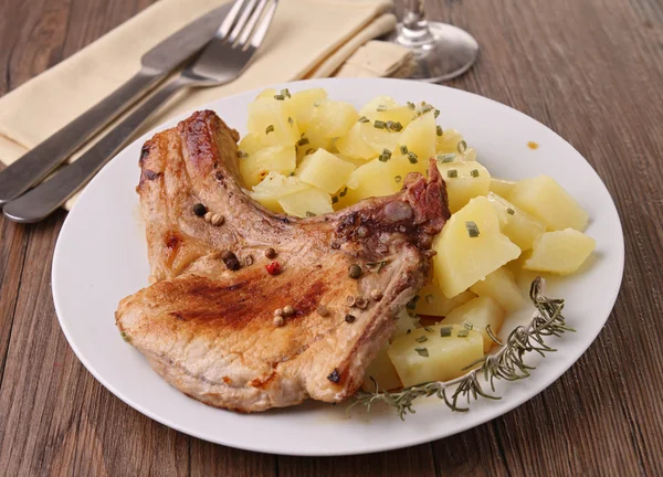 stock image Plate of chop pork with vegetable