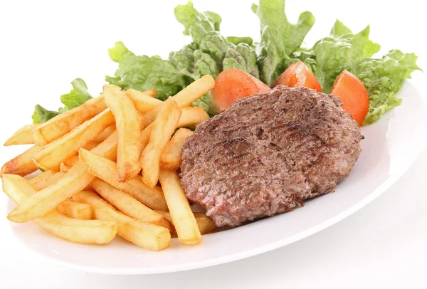 Gegrilde biefstuk, friet en groenten — Stockfoto