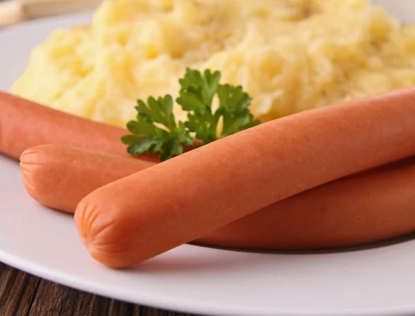 Sausage and puree — Stock Photo, Image