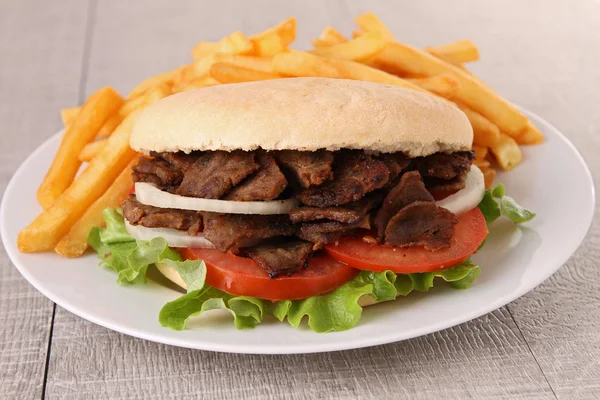 Kebab and french fries — Stock Photo, Image
