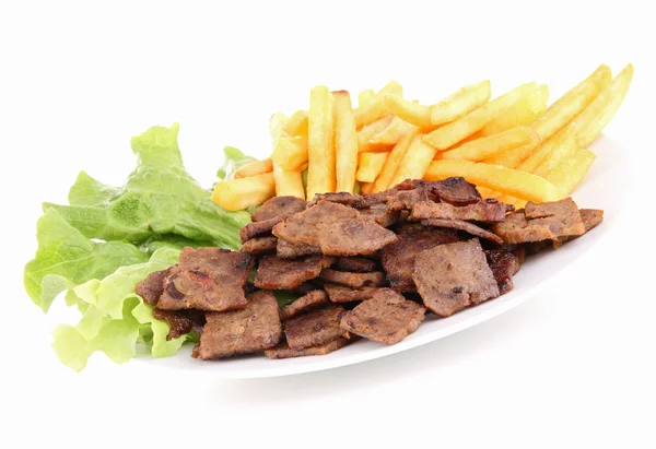 Изолированная тарелка мяса и картошки фри — стоковое фото