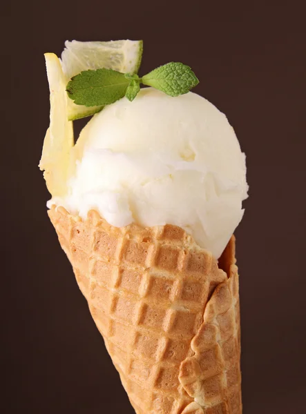 Lemon ice cream in cone — Stock Photo, Image