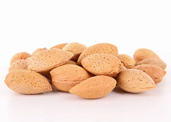 Isolated heap of almond — Stock Photo, Image