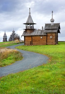 Wooden churches on island Kizhi clipart