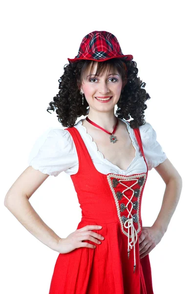 Όμορφη γυναίκα στο κόκκινο φόρεμα και κόκκινο καπέλο — Φωτογραφία Αρχείου