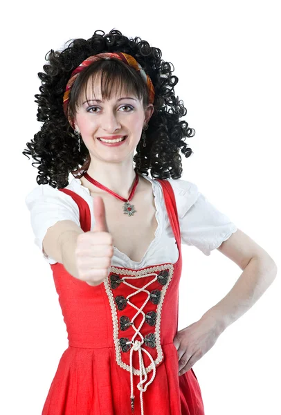 Beautiful woman in the red dress thumbs up — Stock Photo, Image