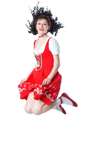 Woman in the red dress jumping — Stock Photo, Image