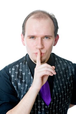 Man holding a finger on his lips clipart