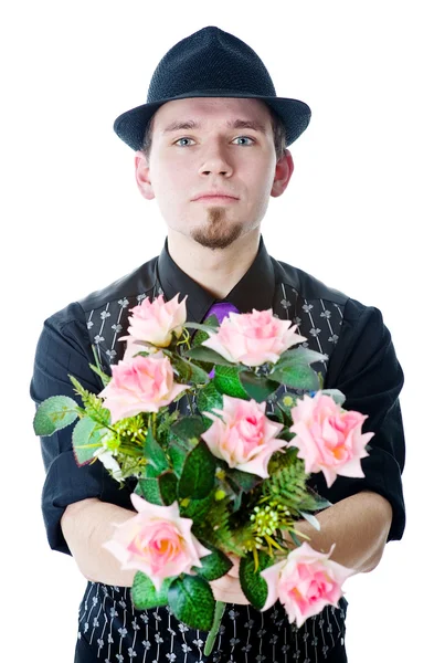 Man in black hat with flowers — Stock Photo, Image