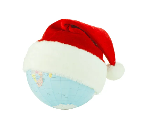 Globo usando chapéu de Papai Noel sobre fundo branco — Fotografia de Stock