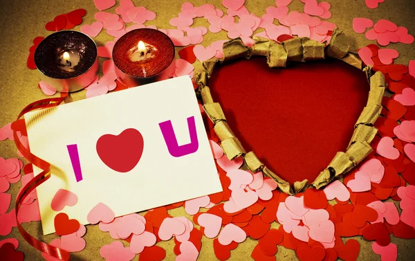 St. Valentinstag Grußwort Hintergrund mit zwei brennenden Kerzen — Stockfoto