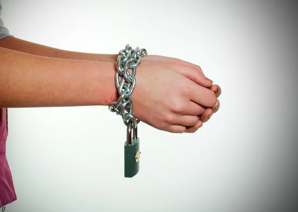 Hands tied up with chains — Stock Photo, Image