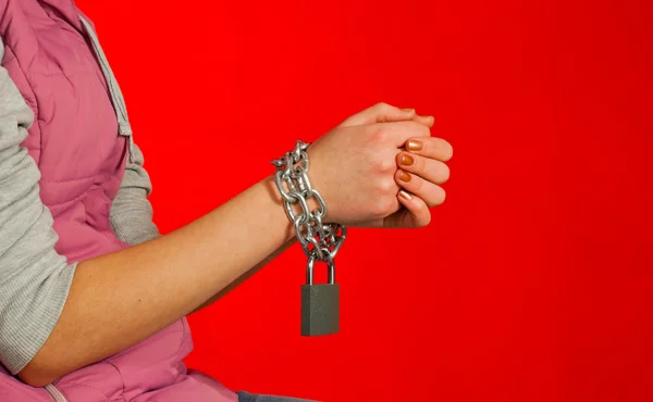 Hands tied up with chains — Stock Photo, Image