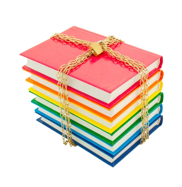 Livros coloridos amarrados com correntes — Fotografia de Stock