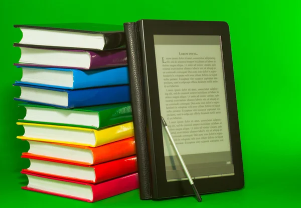 E-book reader with stack of printed books — Stock Photo, Image