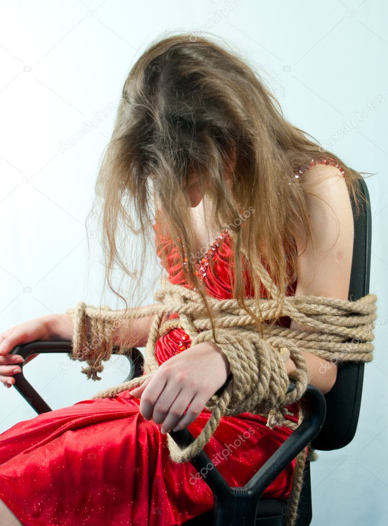 Woman tied up with a rope