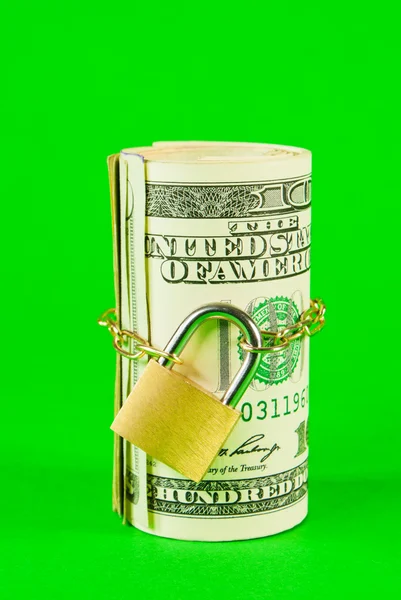Roll of US dollars chained and locked — Stock Photo, Image