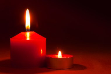 Two burning candles clipart