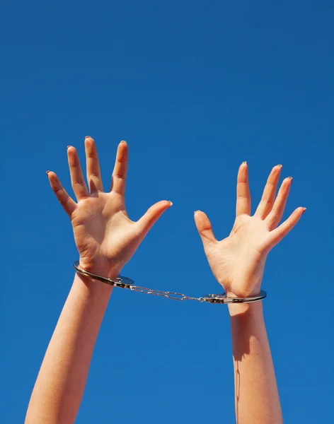 Handcuffed woman's hands — Stock Photo, Image