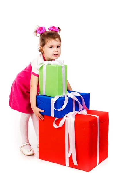 Meisje met geschenkdozen — Stockfoto