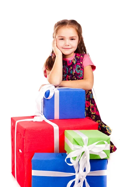 Niña con cajas de regalo — Foto de Stock