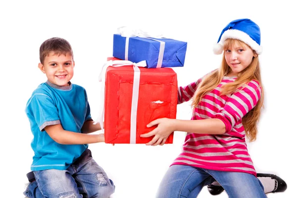 Happy kids with present boxes — Stock Photo, Image