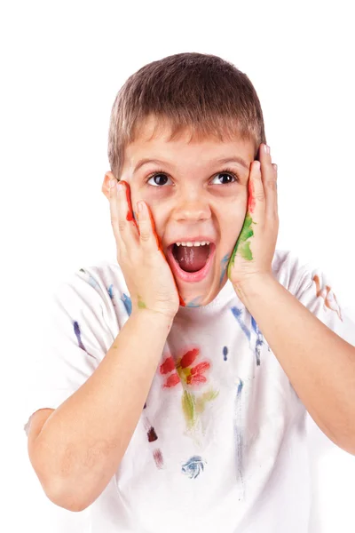 Kleine jongen met handen geschilderd in kleurrijke verf klaar voor hand afdrukken — Stockfoto