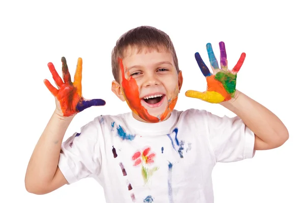 Little boy with hands painted in colorful paints ready for hand prints — Stock Photo, Image