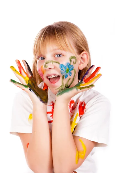Menina bonita com as mãos pintadas em tintas coloridas — Fotografia de Stock