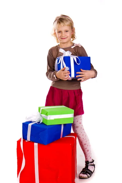 Krásná holčička s dárky — Stock fotografie